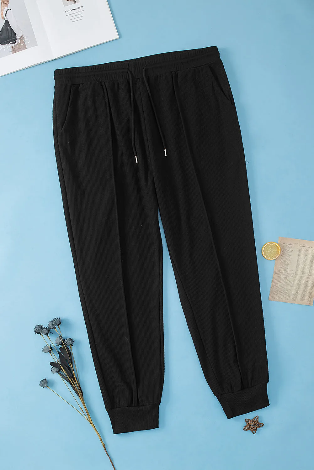 Black Plus Size Textured Exposed Seam Drawstring Jogger Pants