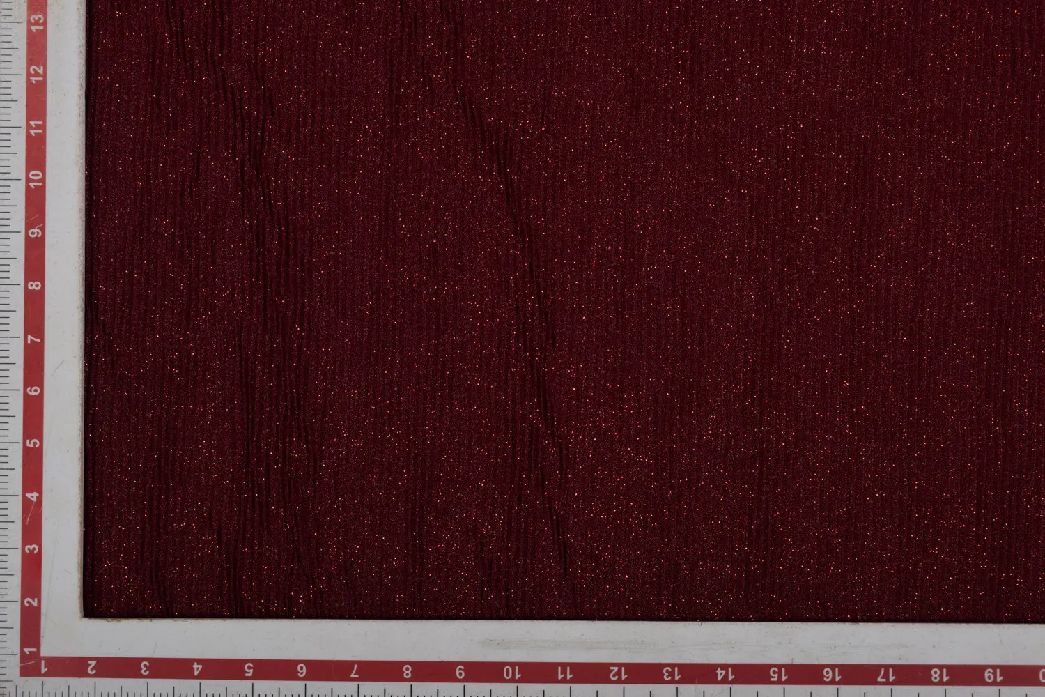 Maroon Pleated Glitter Knit Fabric